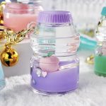 Acrylic milk bottle keychain peach floating quicksand bottle into the oil liquid key key chain bag pendant accessories - Image 3