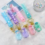 Acrylic milk bottle keychain peach floating quicksand bottle into the oil liquid key key chain bag pendant accessories