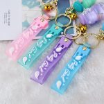 Acrylic milk bottle keychain peach floating quicksand bottle into the oil liquid key key chain bag pendant accessories - Image 2